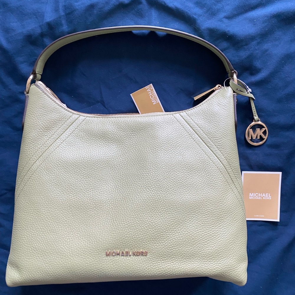 Never been used Michael Kors green purse